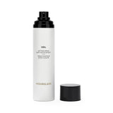 Hourglass Veil setting spray bottle with soft focus effect on skin