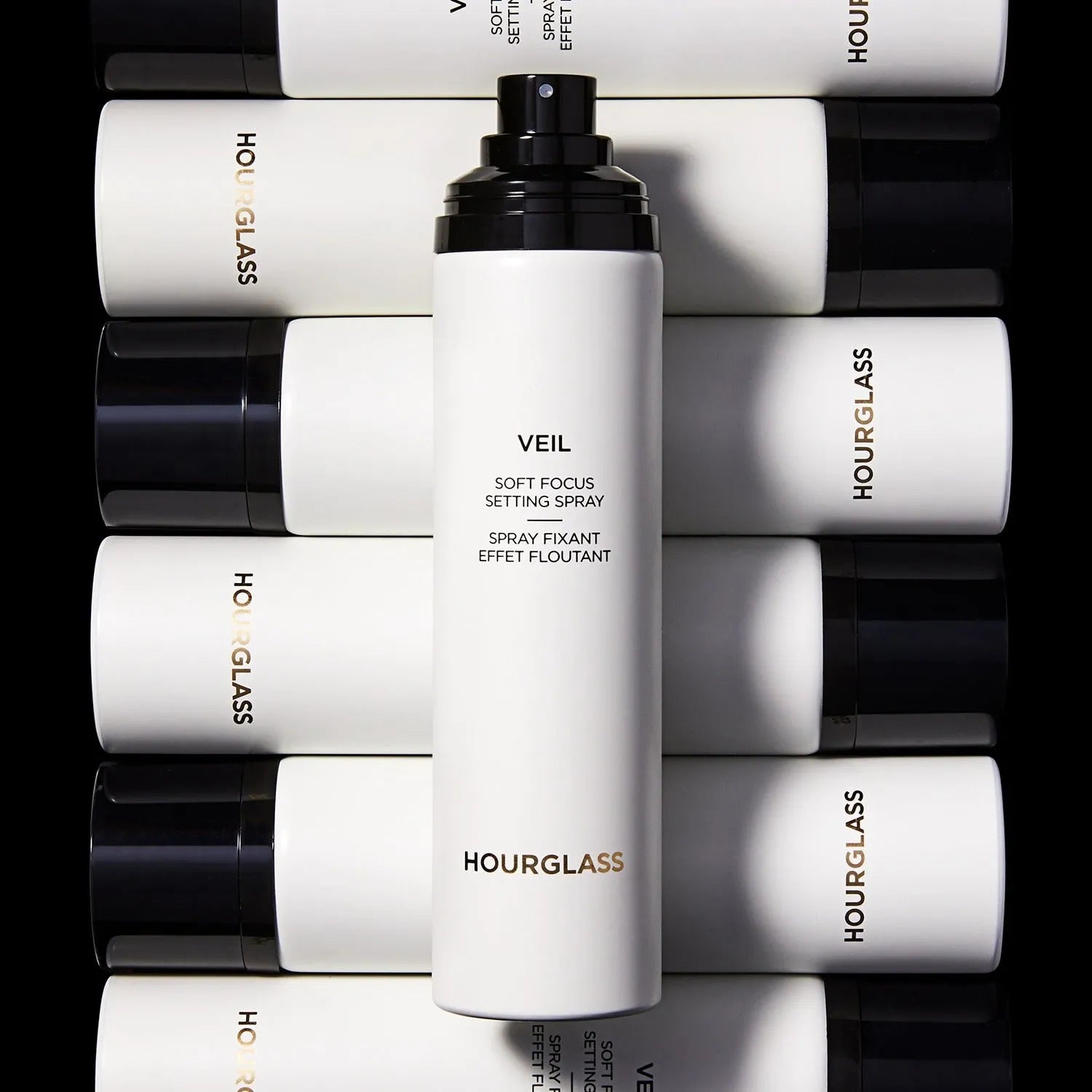 Hourglass Veil Soft Focus Setting Spray bottle with mist spray in action