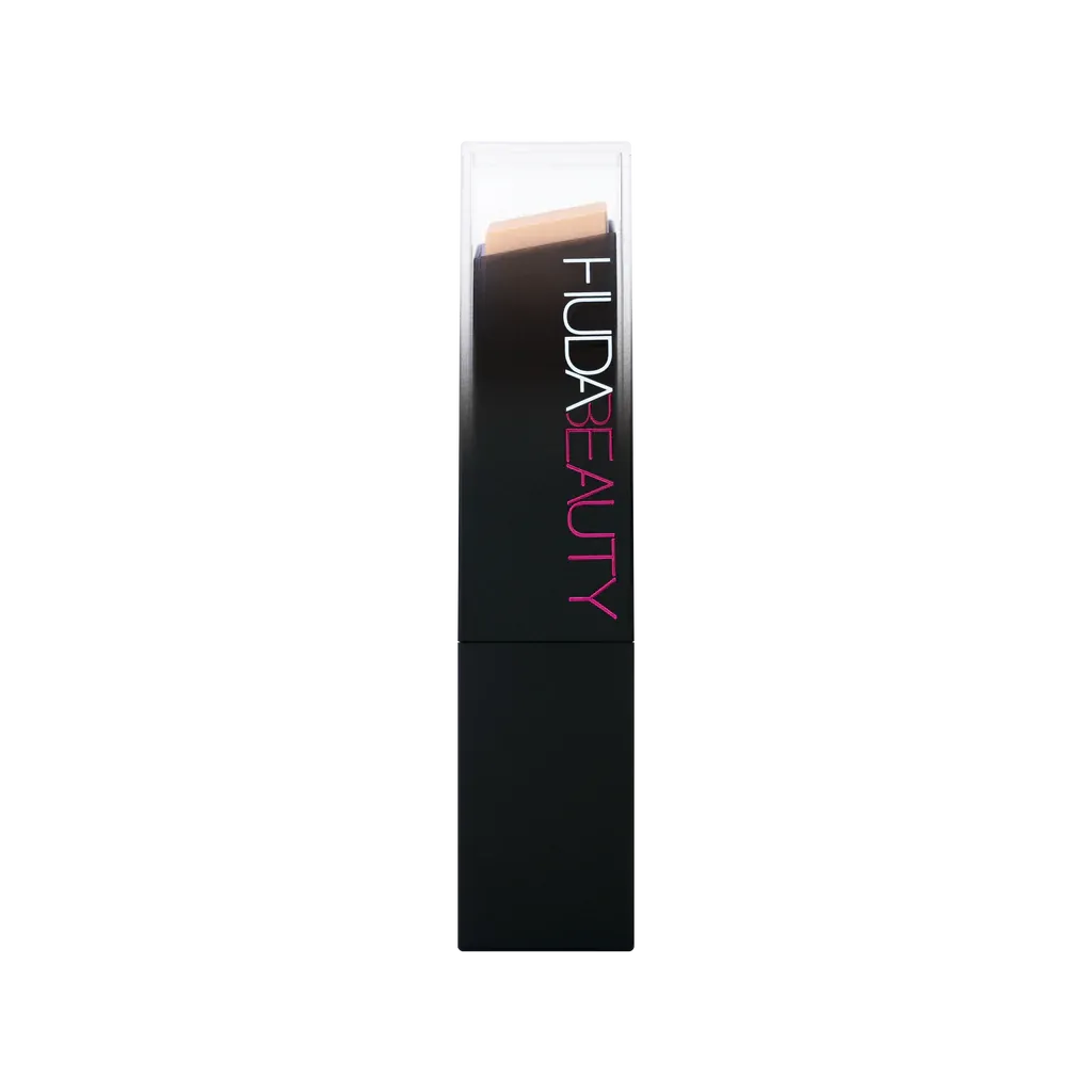 Close-up of Huda Beauty FauxFilter Foundation Stick creamy texture in 150G Creme Brulee