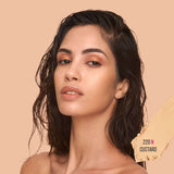 Angled view of Huda Beauty 220N Custard foundation stick with cap off