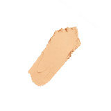 Swatch of Huda Beauty 220N Custard foundation stick on skin showing natural finish