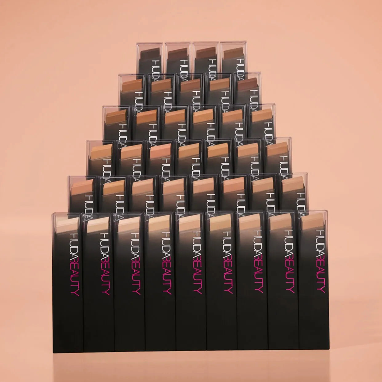 Huda Beauty FauxFilter Foundation Stick 310G Amaretti - application on face