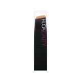 Huda Beauty FauxFilter Foundation Stick 310G Amaretti - side view with cap