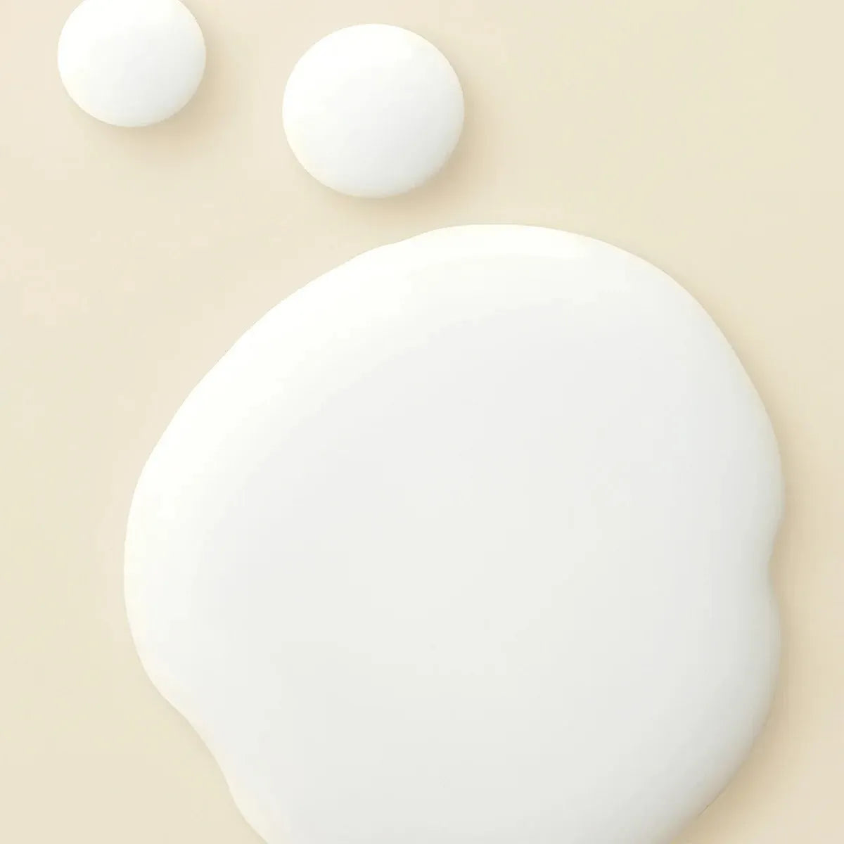 Milky texture of Huda Beauty Glow Coco hydrating mist close-up