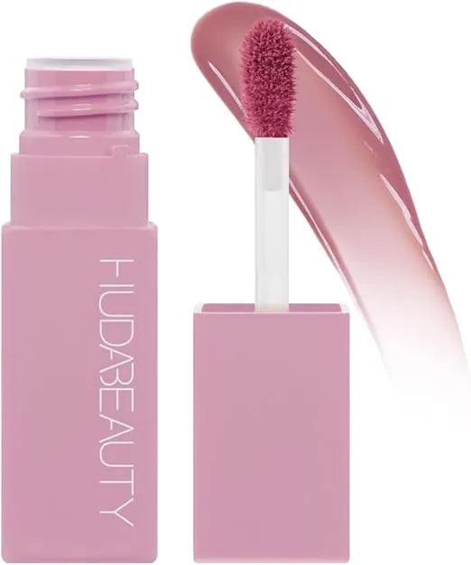 Huda Beauty Lip Blush Creamy tube with doe-foot applicator, showcasing the velvety matte finish of the soft lip tint.