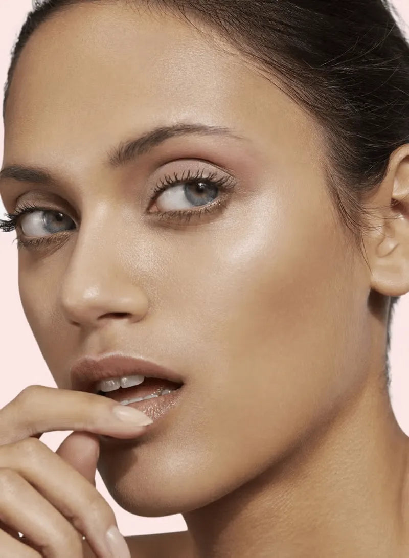 M·A·C Strobe Cream Pinklite with swatch on hand showing luminous glow