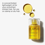Olaplex Nº.7 Bonding Oil 30ml bottle on marble surface