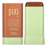 Pixi On-the-Glow Bronze stick applied as cheek bronzer, showing natural radiant sun-kissed glow