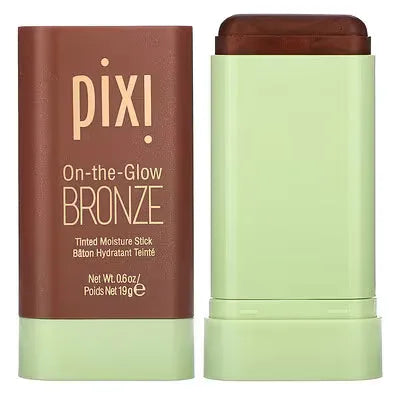 Swatch of Pixi On-the-Glow Bronze on various skin tones, demonstrating blendable creamy texture