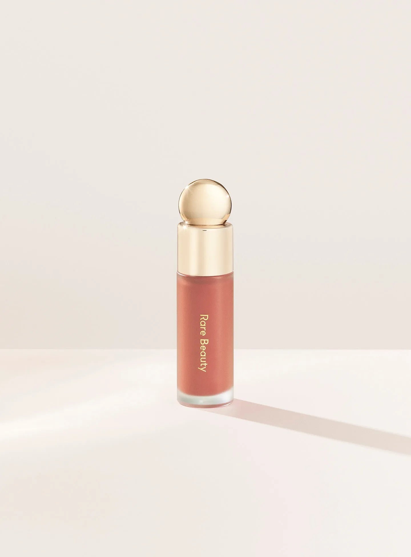 Rare Beauty Soft Pinch Liquid Blush in shade Love (matte terracotta) - product bottle front view