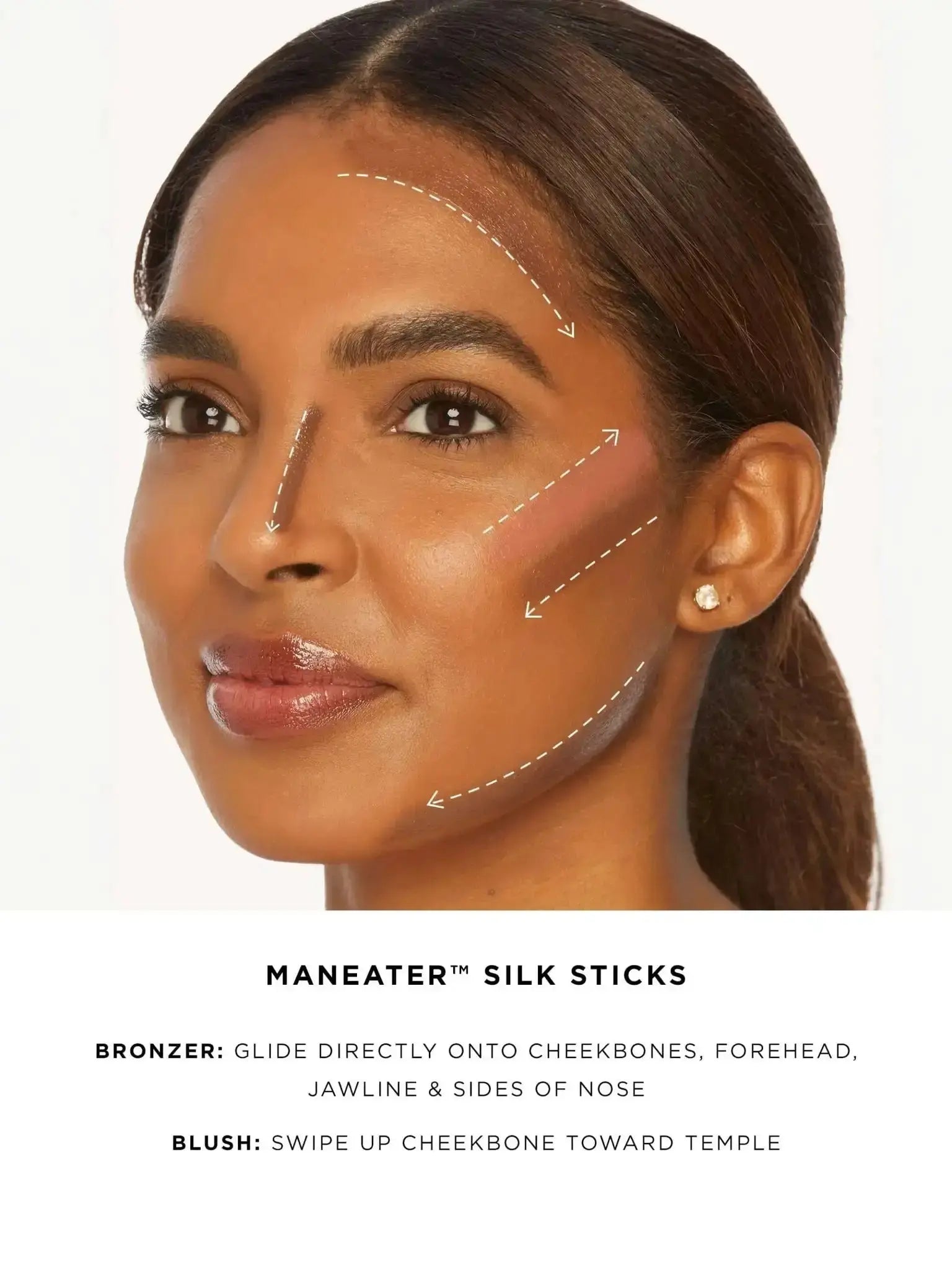 Woman applying Tarte Maneater Silk Stick Blush in Buff to cheek with finger, achieving a natural beautiful flush