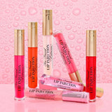 Too Faced Lip Injection Extreme Lip Plumper Bubblegum Yum 4g tube lying on surface with shiny cap