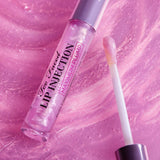 Too Faced Lip Injection Maximum Plump lip gloss bottle and applicator on white background