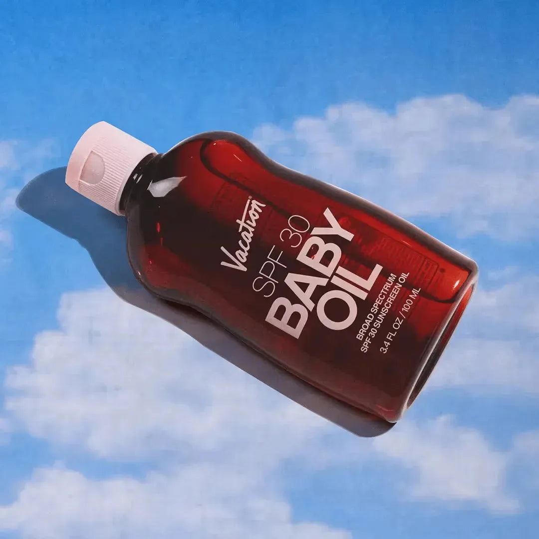 Vacation SPF 30 Baby Oil 100ml angled view - nostalgic baby oil sunscreen for all skin types