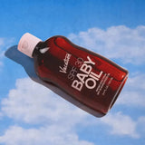 Vacation SPF 30 Baby Oil 100ml angled view - nostalgic baby oil sunscreen for all skin types