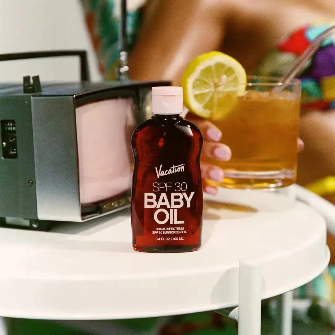 Vacation SPF 30 Baby Oil 100ml back view - ingredient list and SPF 30 protection details